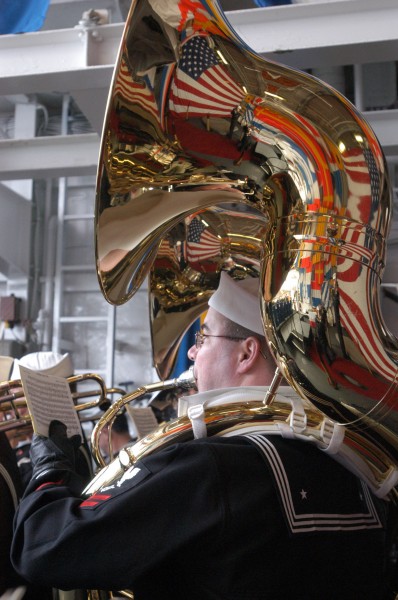 US Navy 030228-N-6477M-153 Musician 2nd Class Lee MacDowell, assigned to the U.S. Navy Band North West performs 