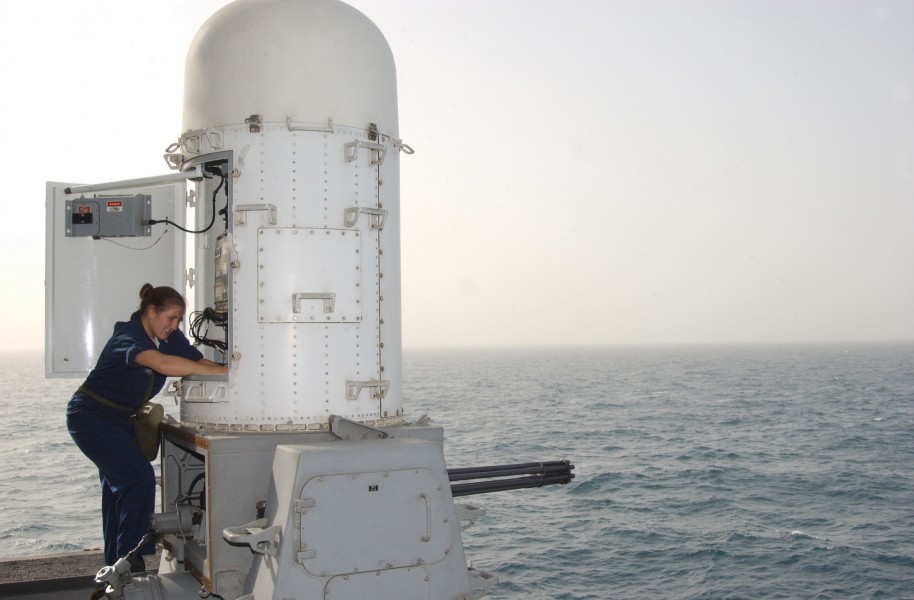 US Navy 030323-N-9403F-004 Fire Controlman 3rd Class Jaquelin Powers from Cooper, Fla. replaces a vertical gyro for a Close in Weapon System (CWIS) aboard the aircraft carrier USS Abraham Lincoln (CVN 72)