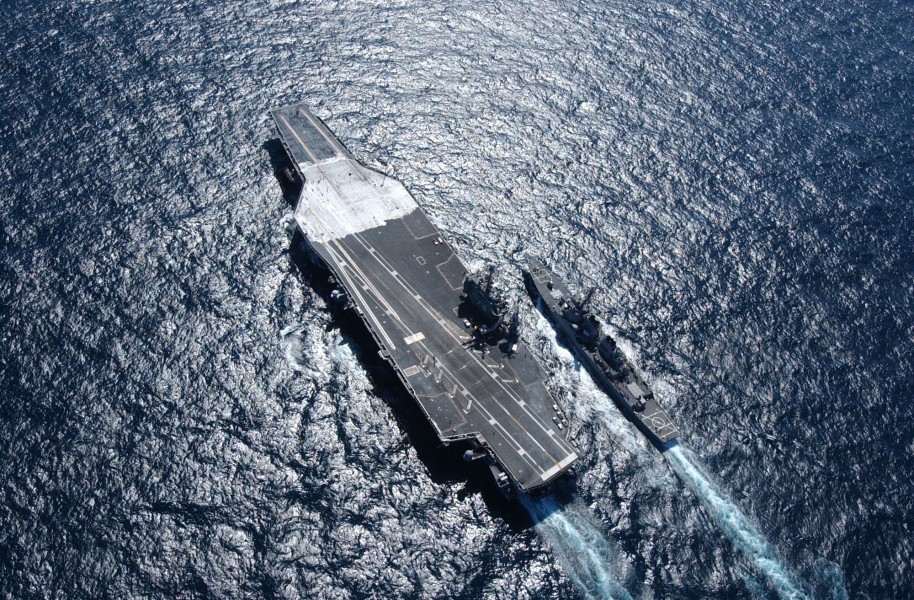 US Navy 030403-N-4768W-160 Guided missile destroyer USS John Paul Jones (DDG 53) pulls along side aircraft carrier USS John C. Stennis 