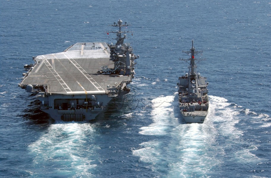 US Navy 030403-N-4768W-185 Guided missile destroyer USS John Paul Jones (DDG 53) pulls along side USS John C. Stennis (CVN 74) during an underway replenishment 