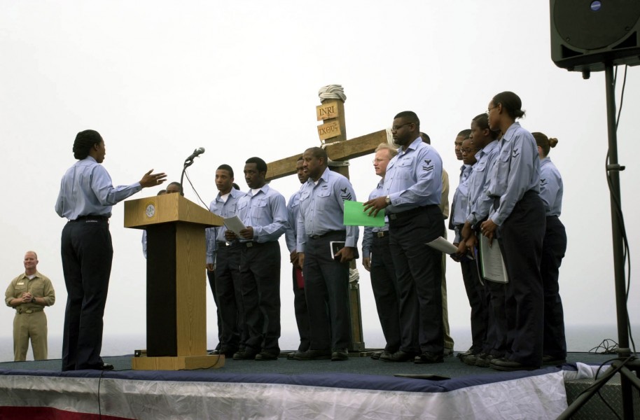 US Navy 030420-N-1577S-002 USS Nimitz (CVN 68) and Carrier Air Wing Eleven (CVW-11) choir sings a song of prayer during the Easter Sunrise Service on the ship^rsquo,s flight deck