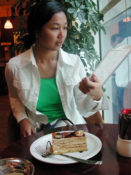 US Navy 030706-N-0413R-001 Airman Maebel Tinoko from Ewa Beach, Hawaii, enjoys dessert during a port call in United Arab Emirates