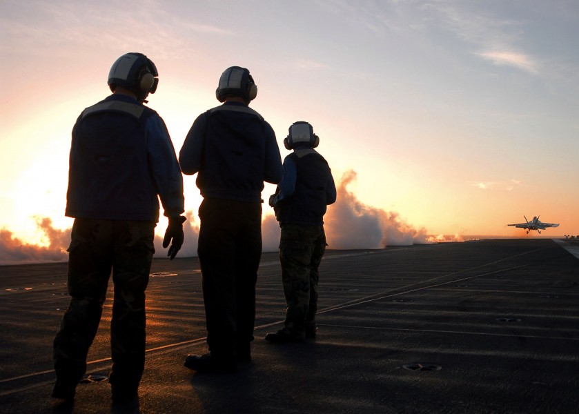 US Navy 030805-N-1573O-978 Flight deck personnel observe an F-A-18F Super Hornet launching from the flight deck aboard USS John C. Stennis (CVN 74)