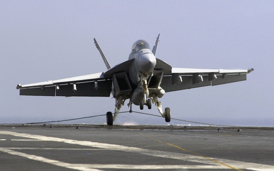 US Navy 030807-N-6213R-171 An F-A-18F Super Hornet makes an arrested landing on the flight deck of USS John C. Stennis (CVN 74)