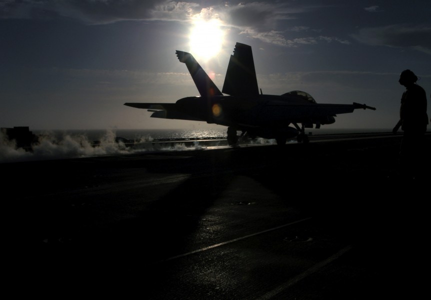 US Navy 030811-N-1573O-043 An F-A-18F Super Hornet launches from the flight deck aboard USS John C. Stennis (CVN 74)