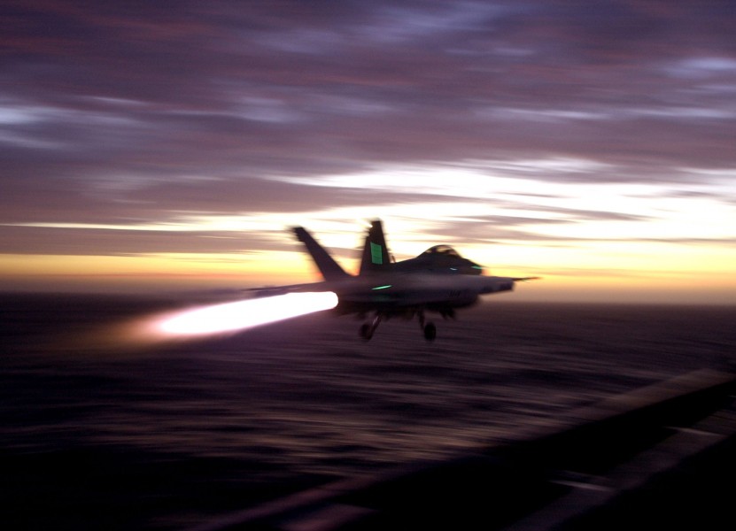 US Navy 030812-N-6213R-179 The afterburners of an F-A-18F Super Hornet light the sky