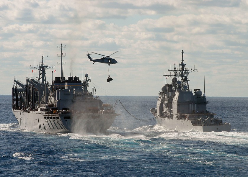 US Navy 031121-N-8213G-002 The Military Sealift Command ship USNS Supply (T-AOE 6) conducts a refueling at sea and vertical replenishment at sea