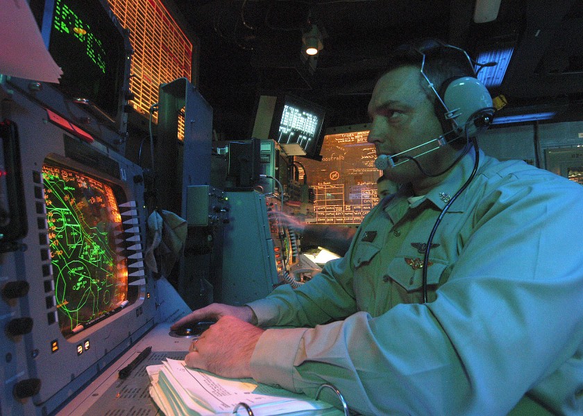 US Navy 031227-N-7408M-001 Chief Aviation Warfare Systems Operator Scott C. Montejo from Freeport, Maine, tracks air targets