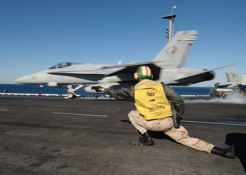 US Navy 040219-N-4374S-010 An F-A-18 Hornet launches from one of four steam powered catapults aboard USS John F. Kennedy (CV 67)