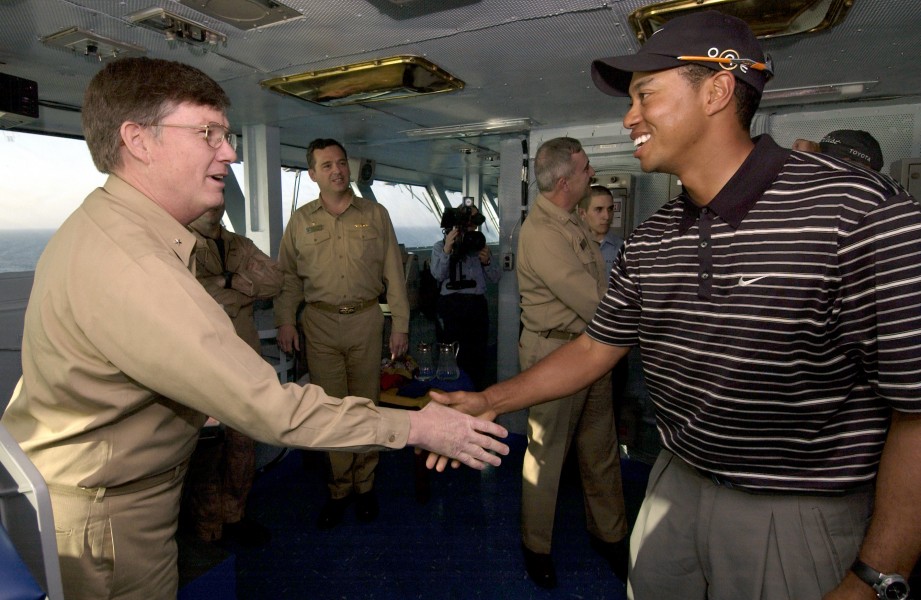 US Navy 040303-N-5319A-001 Tiger Woods meets Commander Carrier Group Eight (CCG-8) Rear Adm. Denby H. Starling II, on the flag bridge aboard the aircraft carrier USS George Washington (CVN 73)