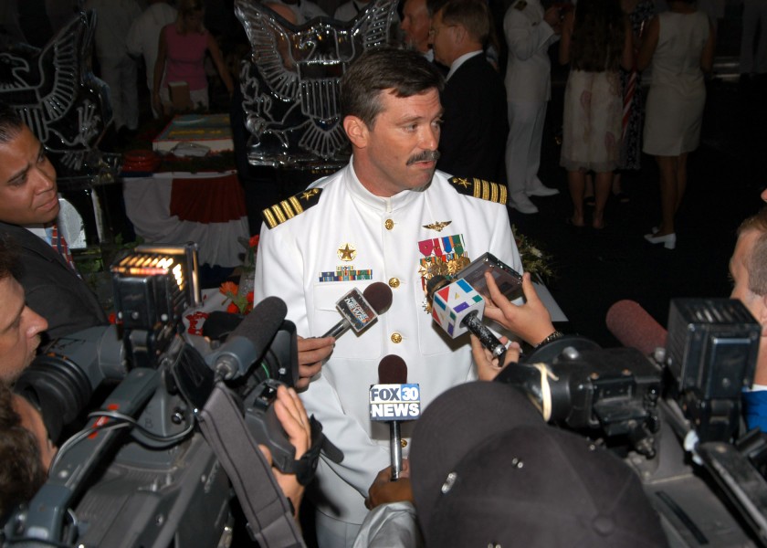 US Navy 040408-N-8704K-003 Capt. Steve Squires addresses local Mayport, Fla. media after assuming command of the aircraft carrier USS John F. Kennedy (CV 67)