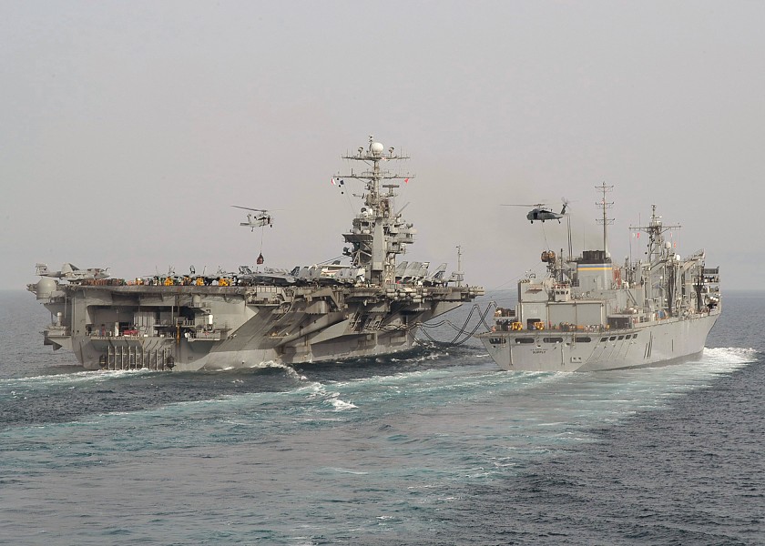 US Navy 040422-N-9630B-018 The Military Sealift Command (MSC) fast combat support ship USNS Supply (T-AOE 6) and USS George Washington (CVN 73) perform a connected replenishment at sea (RAS)