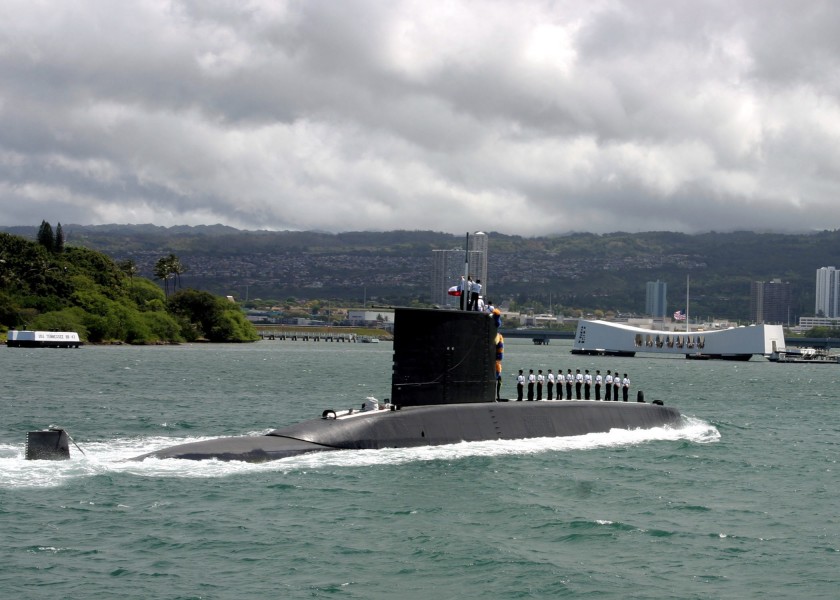 US Navy 040621-N-5539C-001 Chilean Submarine CS Simpson (SS-21) prepares to render honors to the USS Arizona Memorial as the submarine pulls into port in Pearl Harbor, Hawaii