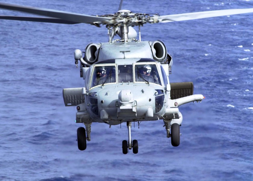 US Navy 040911-N-9293K-126 An SH-60F Seahawk Helicopter attached to Helicopter Anti-Submarine Squadron Two (HS-2) prepares to land aboard the aircraft carrier USS Abraham Lincoln (CVN 72) 