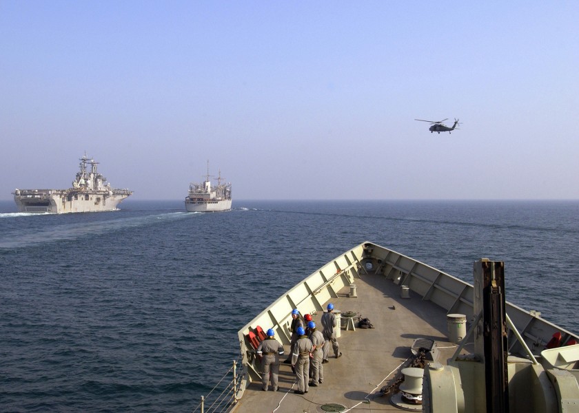 US Navy 040929-N-7034S-005 Royal Australian Navy Sailors make final preparations before pulling along side the fast combat support ship USS Seattle (AOE 3) and the amphibious assault ship USS Essex (LHD 2)