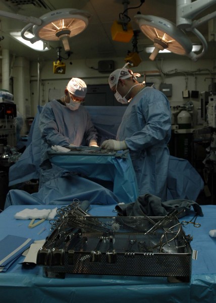 US Navy 041101-N-5384B-012 The Medical Department aboard the Nimitz-class aircraft carrier USS Abraham Lincoln (CVN 72) performs a delicate medical procedure