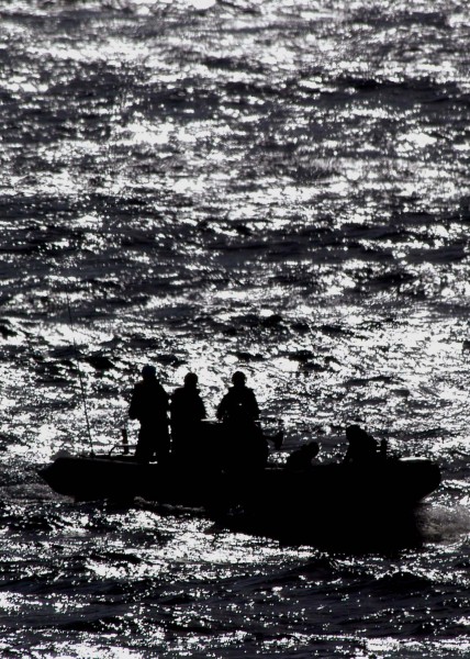US Navy 041116-N-5384B-044 Crew members take part in a simulated man overboard recovery drill aboard USS Abraham Lincoln (CVN 72)