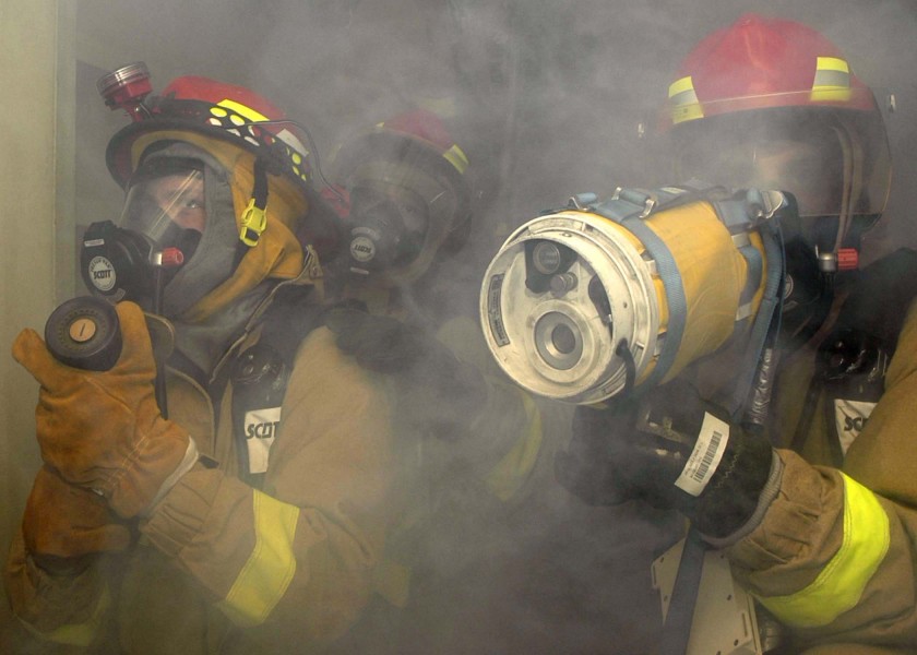 US Navy 041201-N-5837R-218 Sailors assigned to the Seven Bravo repair locker, prepare to fight a mock fire during General Quarter (GQ) onboard the aircraft carrier USS Abraham Lincoln (CVN 72)