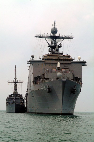 US Navy 041224-N-4772B-277 Mines countermeasure ship USS Dextrous (MCM 13) and the dock landing ship USS Harpers Ferry (LSD-49) conducts replenishment at sea in the Persian Gulf