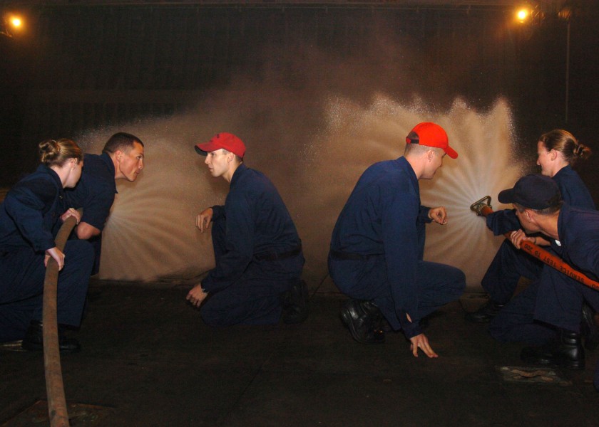 US Navy 050518-N-2059B-019 Damage Controlmen aboard USS Belleau Wood (LHA 3) instruct U.S. Naval Academy Midshipmen