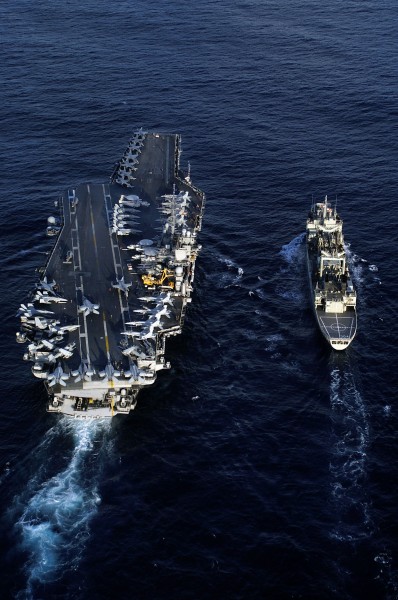 US Navy 050614-N-0120R-116 he conventionally powered aircraft carrier USS Kitty Hawk (CV 63) prepares to receive fuel at sea from the Royal Australian Navy ship HMAS Success (AOR 304)