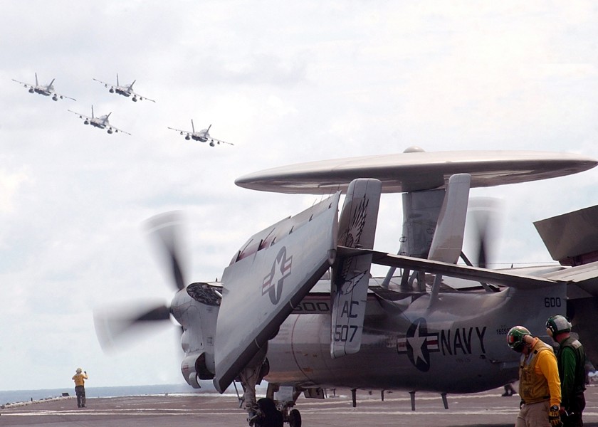 US Navy 050719-N-0535P-049 Four F-A-18C Hornets perform a diamond formation fly-by over the Nimitz-class aircraft carrier USS Harry S. Truman (CVN 75)