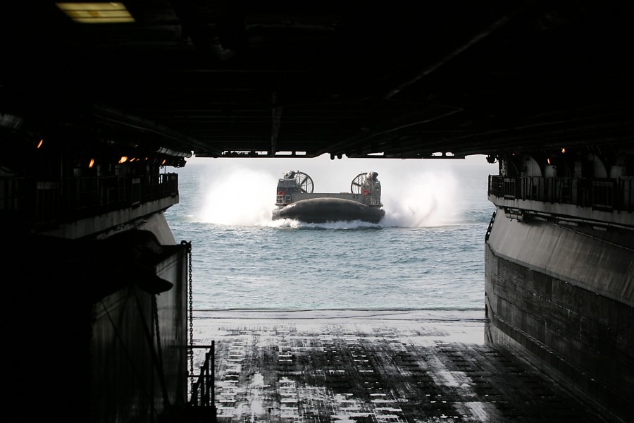 US Navy 050730-M-9114Y-009 A Landing Craft, Air-Cushion (LCAC) prepares to enter the well deck of the amphibious assault ship USS Kearsarge (LHD 3)