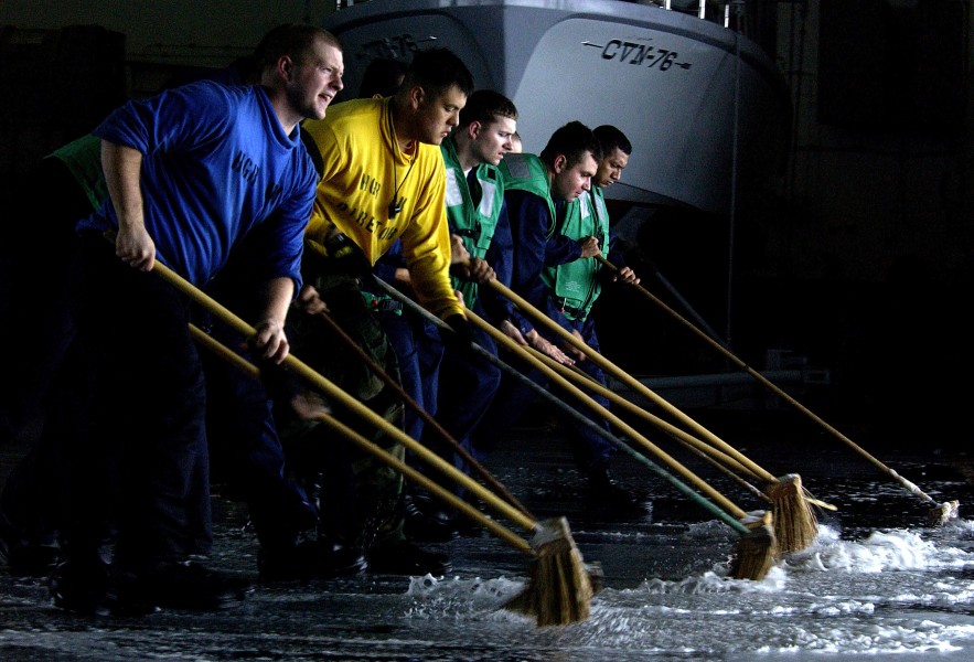 US Navy 050811-N-8213G-088 Sailors conduct a hangar bay scrub down aboard the Nimitz-class aircraft carrier USS Ronald Reagan (CVN 76)