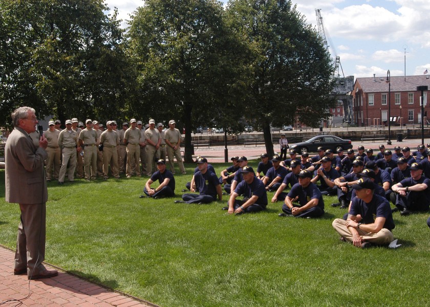 US Navy 050825-N-9076B-002 Medal of Honor recipient Capt. Kelly (ret) talks to the chief petty officer (CPO) selectees training aboard USS Constitution