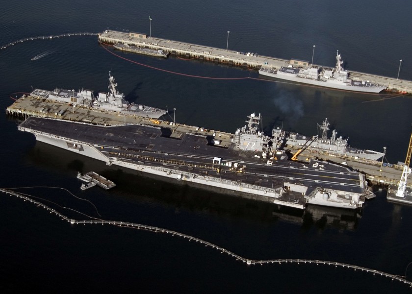 US Navy 051005-N-3622P-005 An aerial view of the Nimitz-class aircraft carrier USS Abraham Lincoln (CVN 72) at its pier on board Naval Station Everett, Wash