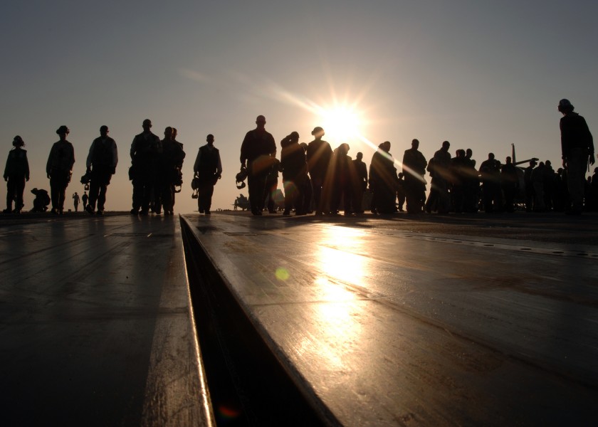 US Navy 051204-N-2838C-005 Air Department and squadron personnel perform a foreign object damage (FOD) walkdown on the flight deck aboard the Nimitz-class aircraft carrier USS Theodore Roosevelt (CVN 71)