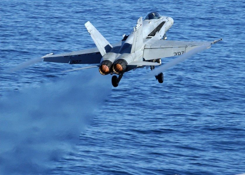 US Navy 060117-N-9898L-034 An F-A-18C Hornet launches from the flight deck aboard the Nimitz-class aircraft carrier USS Abraham Lincoln (CVN-72)