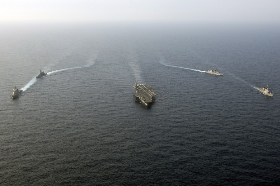 US Navy 060323-N-6074Y-103 Guided-missile destroyer USS Stethem (DDG 63) and Japanese Maritime Self-Defense Force (JMSDF) ships sail in formation during a passing exercise (PASSEX)