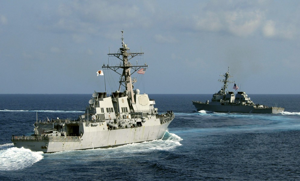 US Navy 060416-N-5384B-178 USS Shoup (DDG 86), right, and USS Russell (DDG 59) take part in a pass in review with the Nimitz-class aircraft carrier USS Abraham Lincoln (CVN 72)
