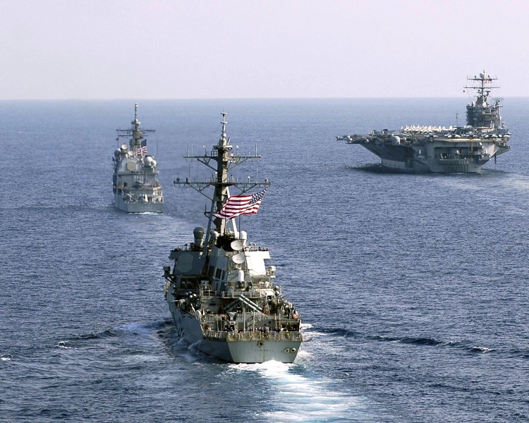 US Navy 060416-N-5837R-027 USS Mobile Bay (CG 53), USS Russell (DDG 59), and USS Shoup (DDG 86) perform a pass and review with the Nimitz-class aircraft carrier USS Abraham Lincoln (CVN 72)