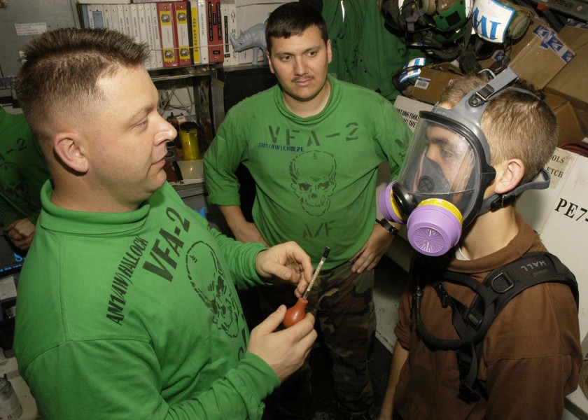 US Navy 060505-N-6060O-061 Strike Fighter Squadron Two (VFA-2) crew members earn hazardous material qualifications aboard the Nimitz-class aircraft carrier USS Abraham Lincoln (CVN 72)