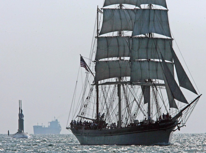 US Navy 060904-N-7441H-001 The tall ship ELISSA, which has sailed in three centuries, leads the Navy's newest attack submarine USS Texas (SSN 775) up the channel into Port Galveston, Texas