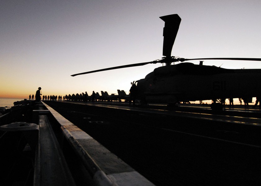 US Navy 061107-N-3729H-036 Flight deck crew members conduct a Foreign Object Debris (FOD) walkdown on the flight deck of the nuclear-powered aircraft carrier USS John C. Stennis (CVN 74)