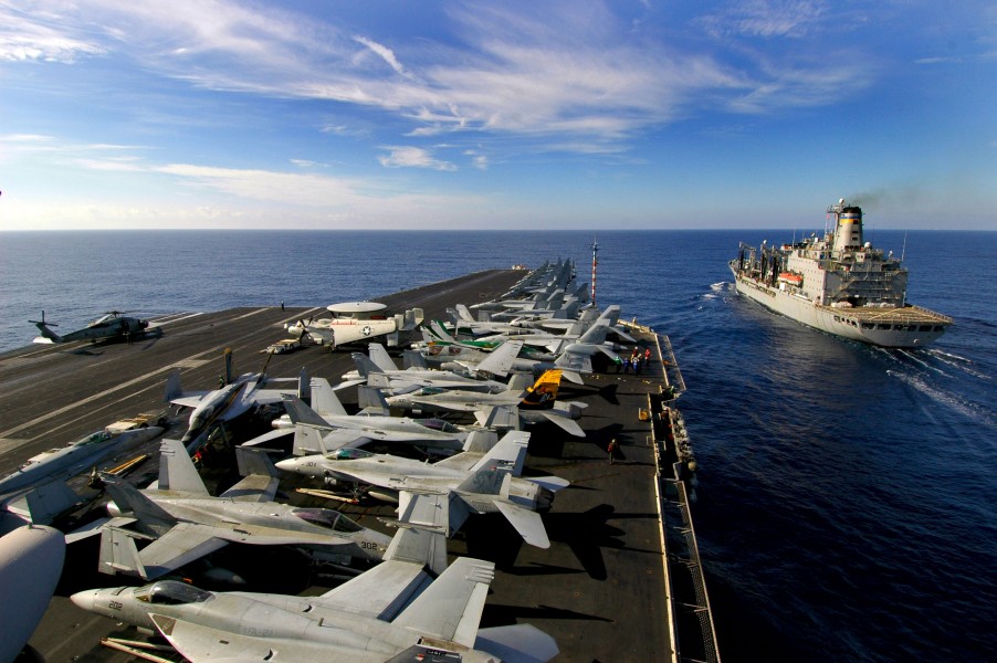 US Navy 061122-N-1960H-020 USS Kitty Hawk (CV 63) pulls along side the Military Sealift Command (MSC) underway replenishment oiler USNS Rappahannock (T-AO 204) during replenishment at sea (RAS)