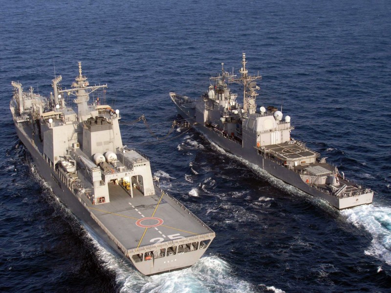 US Navy 061122-N-8036C-215 The Japanese fast combat support ship JDS Mashu (AOE 425) conducts a replenishment at sea (RAS) with the guided-missile cruiser USS Anzio (CG 68)