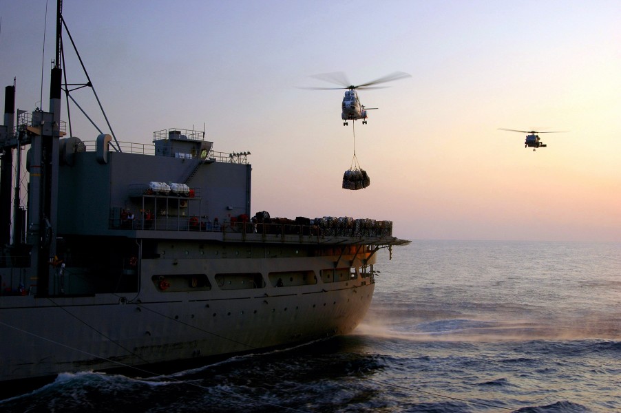 US Navy 061130-N-0490C-004 An SA-330 Puma helicopter assigned to Military Sealift Command (MSC) combat stores ship USNS Spica (T-AFS 9) moves supplies during a vertical replenishment (VERTREP)