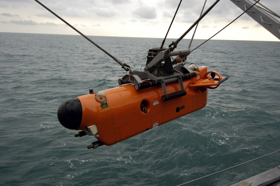 US Navy 061201-N-5555T-003 One of the Navy's Mine Neutralization Vehicles (MNV) is lowered over the side prior to a mine countermeasure exercise aboard USS Ardent (MCM 12)