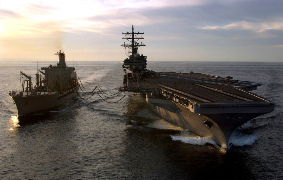 US Navy 070128-N-4776G-218 Connected by fuel hoses, Military Sealift Command (MSC) underway replenishment oiler USNS Yukon (T-AO 202) transfers JP-5 to USS Ronald Reagan (CVN 76) during a refueling at sea