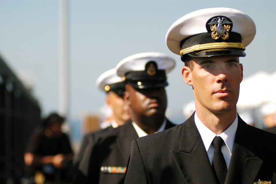 US Navy 070221-N-6410J-361 Officers and Chiefs stand at attention during the decommissioning ceremony for USS Ogden (LPD 5)