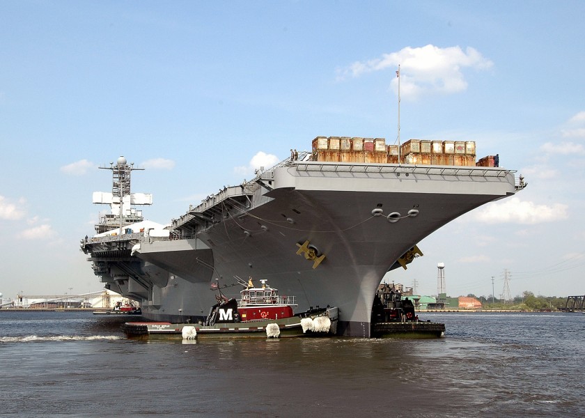 US Navy 070425-N-8403A-107 Tug boats steady the bow of USS George Washington (CVN 73) as the aircraft carrier transits from dry dock to a wet slip