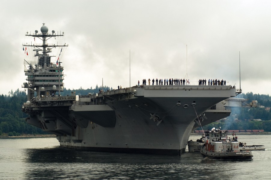 US Navy 070820-N-3390M-002 Nimitz-Class aircraft carrier USS Abraham Lincoln (CVN 72) prepares to moor pierside at her homeport of Naval Station Everett after a scheduled underway period