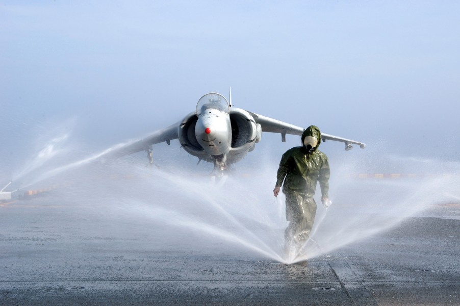 US Navy 080205-N-4781D-002 Damage Controlman Fireman Felicia Garcia checks sprinklers for blockage on the counter measure wash down system of USS Iwo Jima (LHD 7)