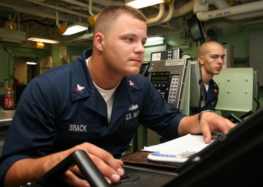 US Navy 080712-N-6764G-090 Damage Controlman 3rd Class Kaleb Brack monitors the damage control console in damage control central