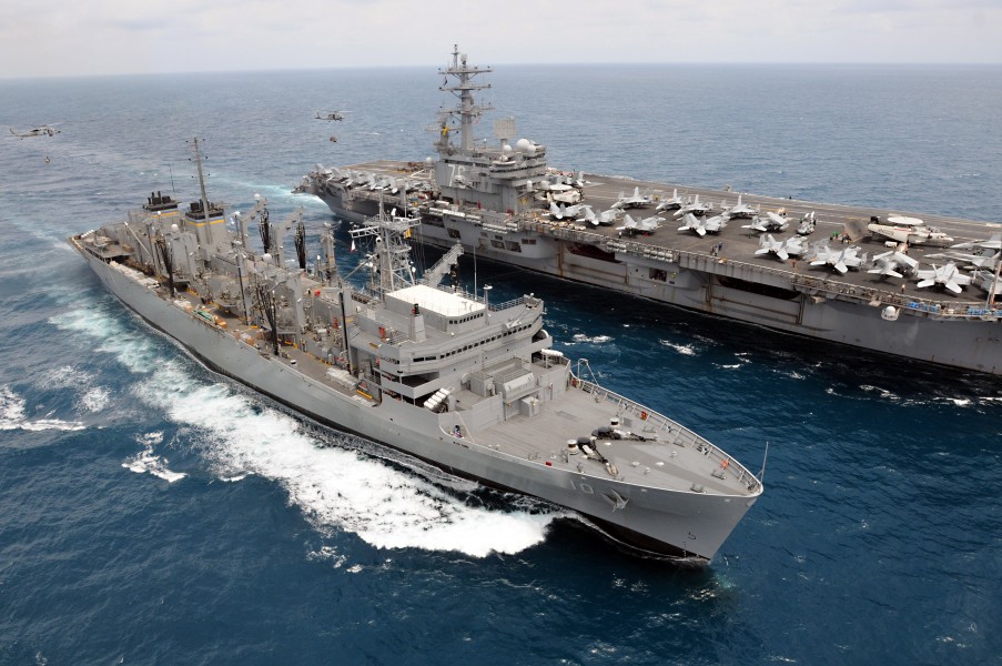 US Navy 080815-N-5961C-004 Two SH-60 Sea Hawk helicopters move pallets of supplies between the aircraft carrier USS Ronald Reagan (CVN 76) and the Military Sealift Command fast combat support ship USNS Bridge (T-AOE 10)
