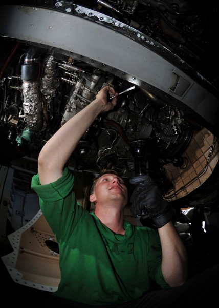 US Navy 080927-N-1745W-001 Aviation Electrician's Mate 2nd Class Michael Wood, From San Diego, paints an F-A-18F Super Hornet assigned to the 